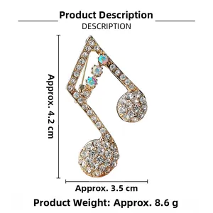 Detailed view of gold music note brooch with rhinestones and size specifications