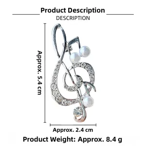 Detailed view of silver musical note brooch with white pearls and sparkling rhinestones