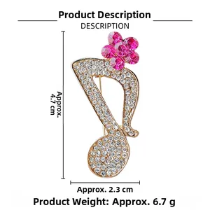 Detailed view of music note brooch with pink flower rhinestones and size measurements