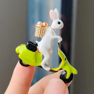 Cute white bunny on green scooter enamel brooch with sparkling stones and pearls