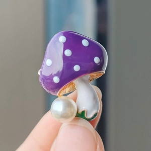 Cute purple enamel mushroom brooch with white polka dots and a large pearl accent