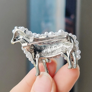 Elegant sheep brooch with silver metal base and inlaid white pearls for women