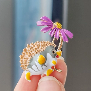 Enamel hedgehog brooch with purple flower and golden alloy finish for daily wear