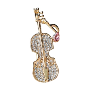 Exquisite violin brooch with gold finish, sparkling rhinestones and pink crystal note accent