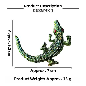 Detailed size view of a large crocodile brooch with green crystals measuring 6.2cm x 7cm