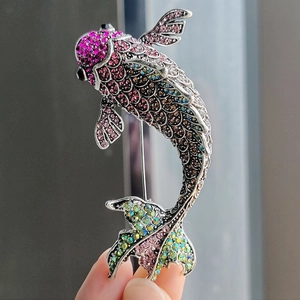 Rainbow rhinestone koi fish brooch with gradient crystals on silver metal base