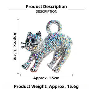 Close-up of sparkling rhinestone cat brooch showing precise 1.5cm by 1.5cm dimensions
