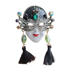 Exquisite Venetian mask brooch with green gemstone, rhinestones and black silk tassel