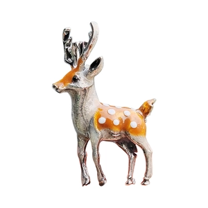 Exquisite silver sika deer brooch with orange enamel finish and white polka dots
