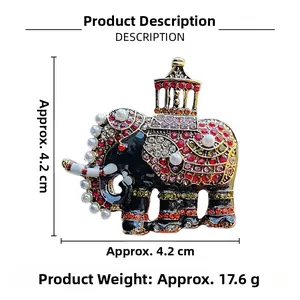 Detailed view of an ornate elephant brooch with colorful rhinestones and size dimensions