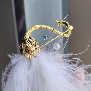 Vintage gold swan brooch with white feathers, blue crystal and pearl for women