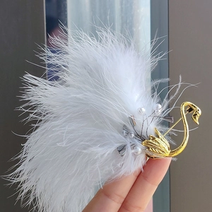 Elegant vintage gold swan brooch with white feathers and faux pearls accessory