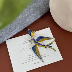 Exquisite blue and yellow enamel swallow brooch with sparkling crystals for elegant suits