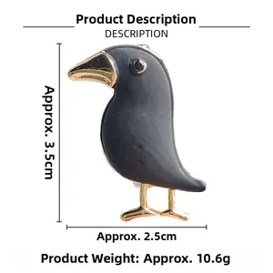 Detailed view of crow brooch dimensions 3.5cm x 2.5cm with gold beak and black diamond eye