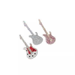 Elegant guitar brooches with sparkling rhinestones in red, silver, and pink finishes