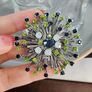 Vintage floral sunflower brooch with navy blue crystals and silver metal base