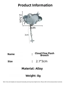Detailed size view of silver cloud brooch with crystal star and lightning pendant