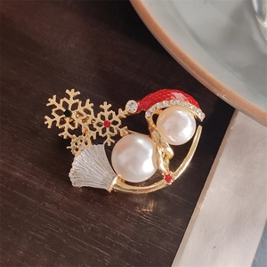 Christmas snowman brooch with pearls and golden snowflakes for winter sweaters and coats