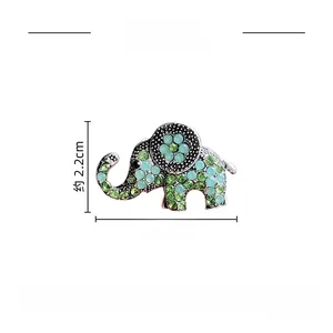 Detail view of elephant brooch with rhinestones showing dimensions 3.5cm by 2.2cm