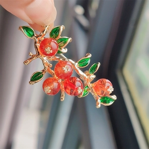 Elegant Chinese style persimmon brooch with golden branch and red fruit design