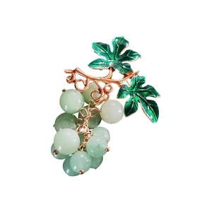Elegant gold alloy grape brooch with light green translucent beads and green leaves