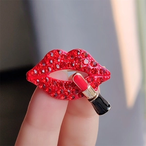 Sparkling red crystal lip and lipstick brooch in gold finish for stylish women