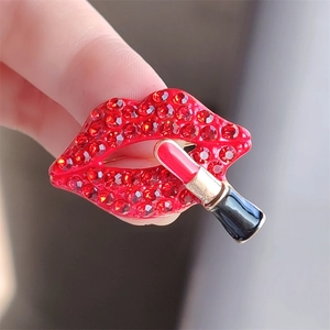Sparkling red lips and lipstick brooch with crystals and gold finish for women