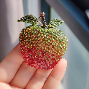 Vintage style apple brooch with gradient red and orange rhinestones and green leaves