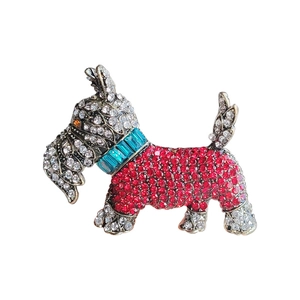 Sparkling Scottish Terrier dog brooch with red and white rhinestones on vintage gold base