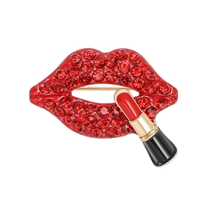 Sparkling crystal red lips and lipstick brooch pin in polished gold finish on white back
