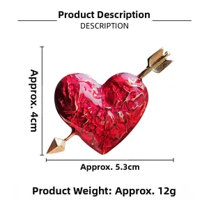 Detail view of heart and arrow brooch with dimensions 5.3cm x 4cm and 12g weight