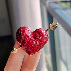 Cupid arrow red heart brooch pin with vintage gold metal and textured enamel finish