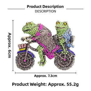 Detailed view of a vintage frog prince cycling brooch with rhinestones and size dimensions