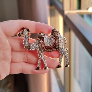 Vintage gold camel brooch with sparkling crystals and brown enamel for suit jacket