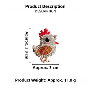 Détails de la broche coq en strass montrant la taille 3,8cm x 3cm et le poids de 11,8g