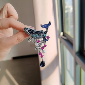 Vintage whale brooch with blue rhinestones, pearls and water-drop pendant detail