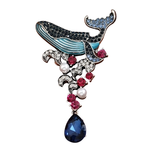 Vintage whale brooch with blue rhinestones, pearls and a teardrop gemstone pendant