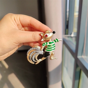 Vintage style squirrel brooch in gold finish with striped shirt and sparkly rhinestones