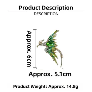 Vue détaillée des dimensions d'une broche phénix de luxe avec émail vert et cristaux