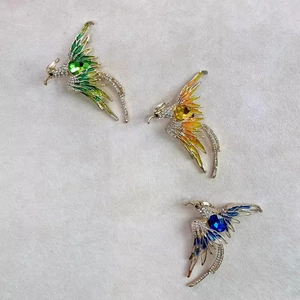 Broches phénix luxueuses avec cristaux colorés et strass disponibles en trois couleurs