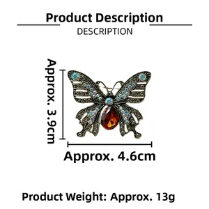 Detailed view of vintage butterfly brooch with dimensions 4.6cm by 3.9cm and 13g weight