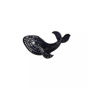 Elegant blue crystal whale brooch with pearl accent and silver-tone finish on white background