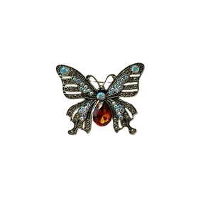 Vintage butterfly brooch with amber crystal and rhinestones in bronze metal finish