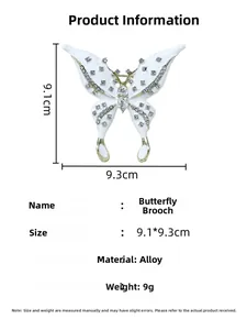 Detailed size specifications for the white butterfly brooch with sparkling rhinestones