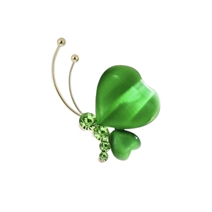 Exquisite butterfly brooch with green heart cat-eye wings and sparkling crystal rhinestones