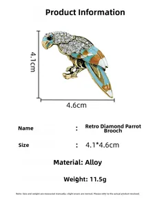 Detailed view of vintage parrot brooch with crystal rhinestones and enamel accents