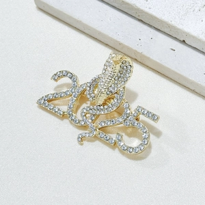 Golden 2025 Snake Brooch featuring sparkling rhinestones for Chinese New Year gifts