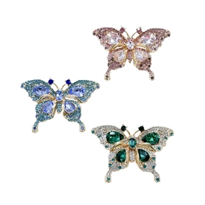 Elegant butterfly brooches with crystal rhinestones in pink, blue, and emerald green colors