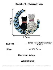Detailansicht der Mond-Katzen-Brosche mit blauen Steinen und Maßangaben in CM