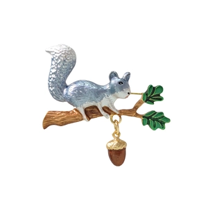 Japanese style squirrel brooch pin with acorn pendant on branch in silver-blue finish